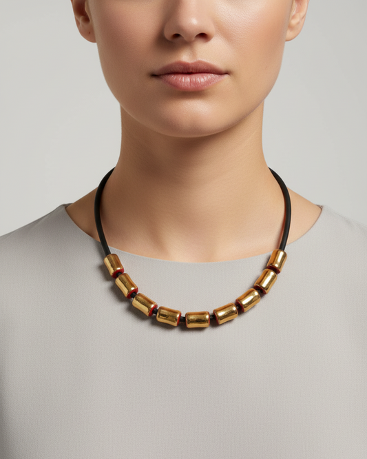 Girocollo in ceramica - cilindretti oro e rosso