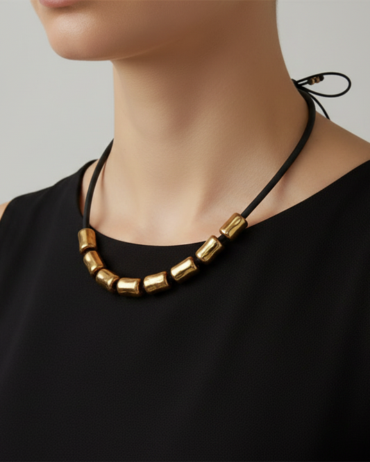 Girocollo in ceramica - cilindretti oro