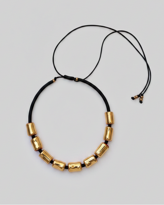 Girocollo in ceramica - cilindretti oro