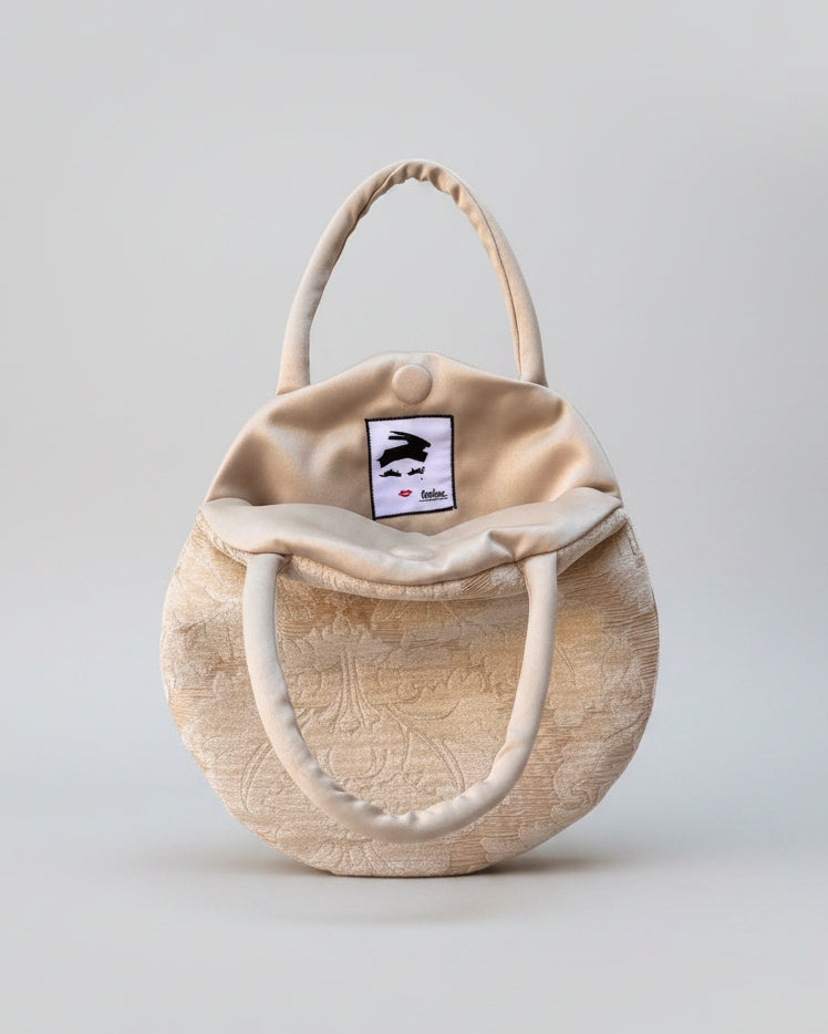 Borsa Baloon in tessuto di damasco chiaro