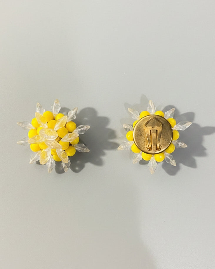 Vintage earring with yellow pearls and transparent elements