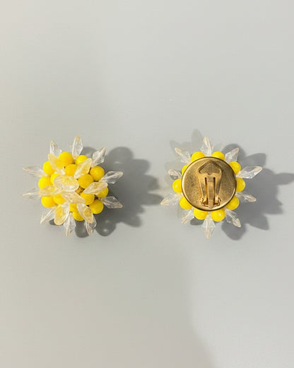 Vintage earring with yellow pearls and transparent elements