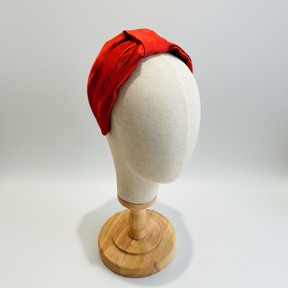 Cerchietto per capelli con nodo piatto