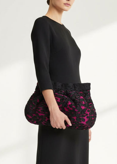 Lace clutch with velvet embellishments