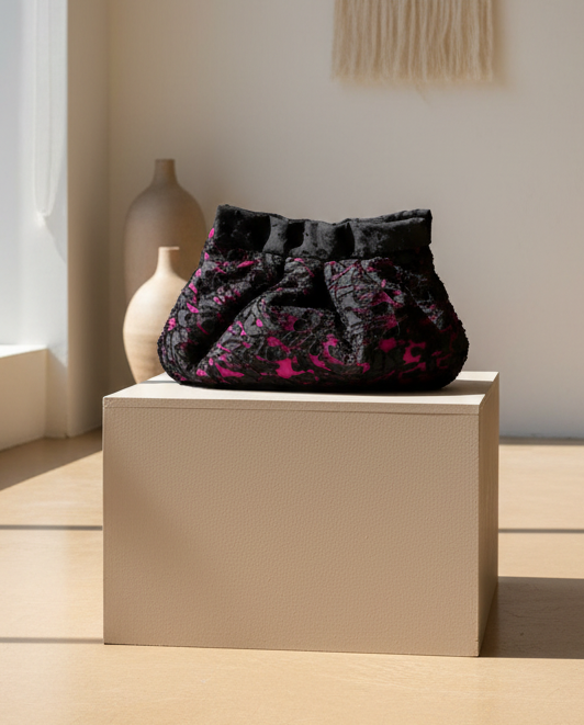 Lace clutch with velvet embellishments