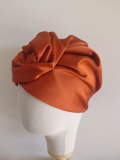 Turbante Camelia  (rosa, giallo, ruggine)